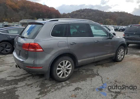 2014 Volkswagen Touareg V6 z USA, uszkodzony, nr VIN WVGEF9BP4ED002056